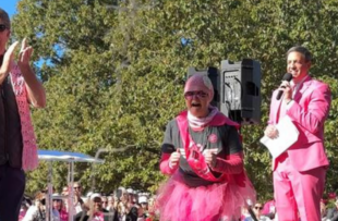 Dawn Konopka is surprised after seeing six of her friends at the In the Pink walk.