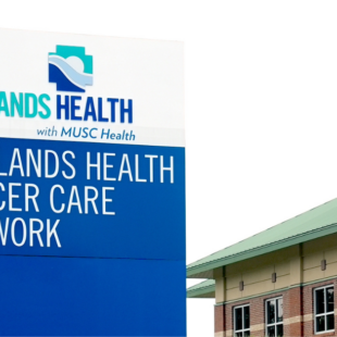 A sign outside that reads Tidelands Health Cancer Care Network