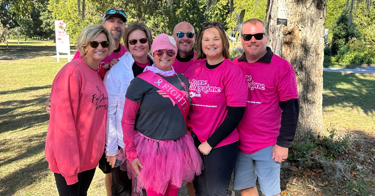 Dawn Konopka smiles with her six friends after the In the Pink walk.