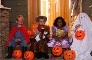 Group of kids in Halloween costumes