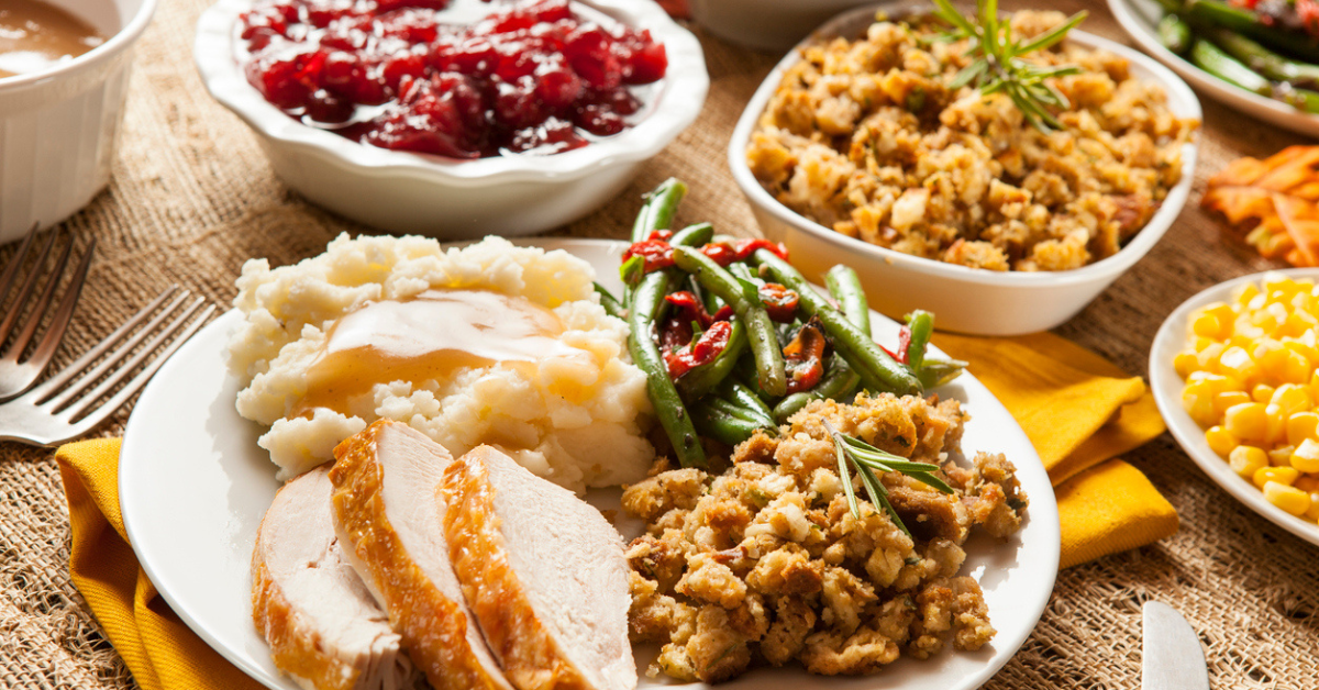 Homemade Turkey Thanksgiving Dinner with Mashed Potatoes, Stuffing, and green beans.