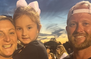 Ryan Baltz with his daughter and girlfriend.