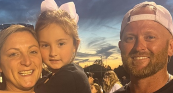 Ryan Baltz with his daughter and girlfriend.