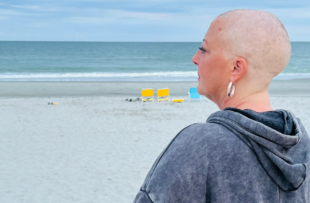 Maribeth Lamuraglia stares out at he ocean.